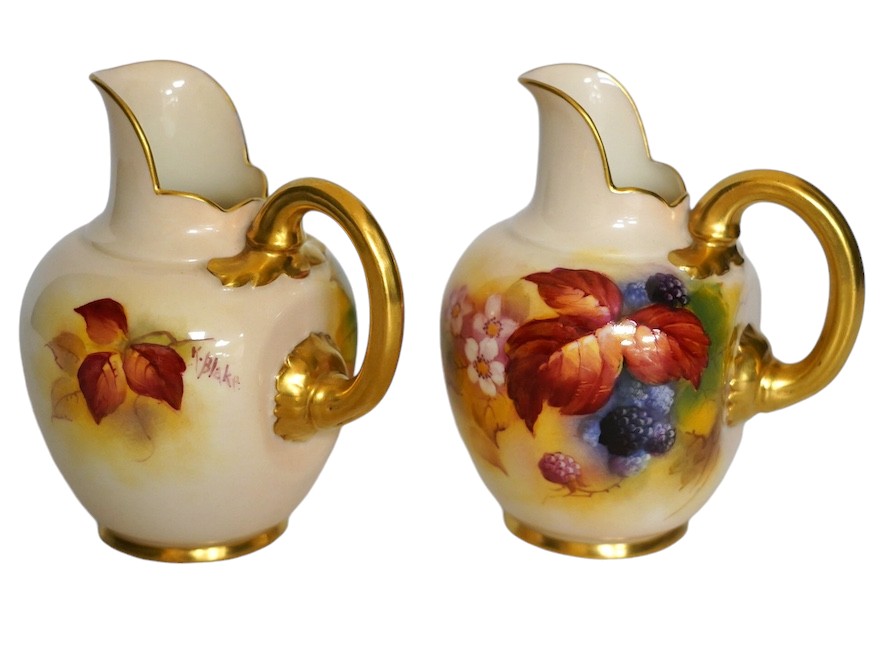 Kitty Blake for Royal Worcester, a pair of porcelain ewers, hand painted with autumn leaves and berries, shape 1094, 11cm. Condition - good